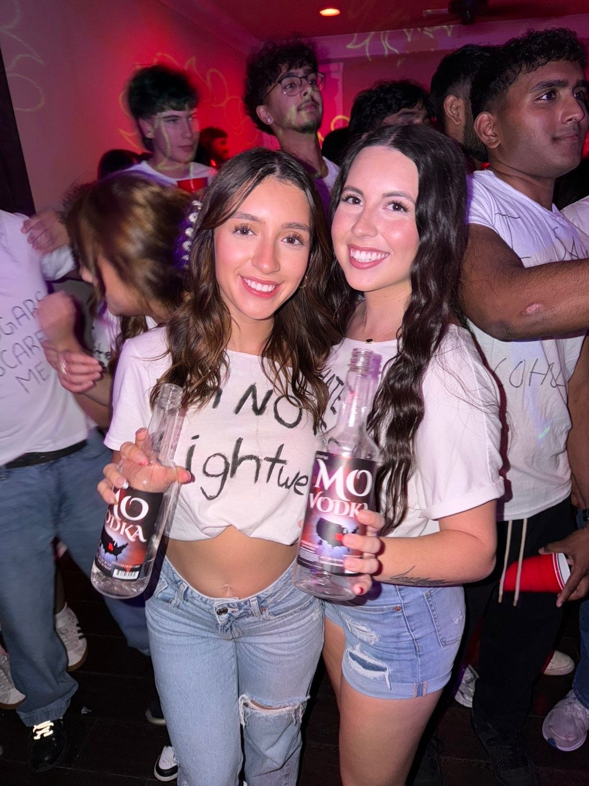 Hot girl holding Mo's Vodka