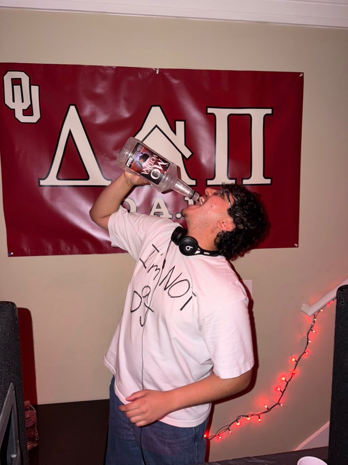 Girls holding Mo's Vodka